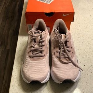 Womens Nike Revolution 5. Size 5:5, light pink. Never worn.